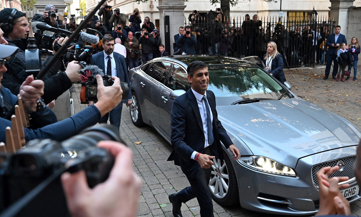 Rishi Sunak arrives at Conservative Party Headquarters in central London, Britain on October 24, 2022. He will be UK's next prime minister replacing Liz Truss, who resigned after just 45 days in office. Photo: AFP