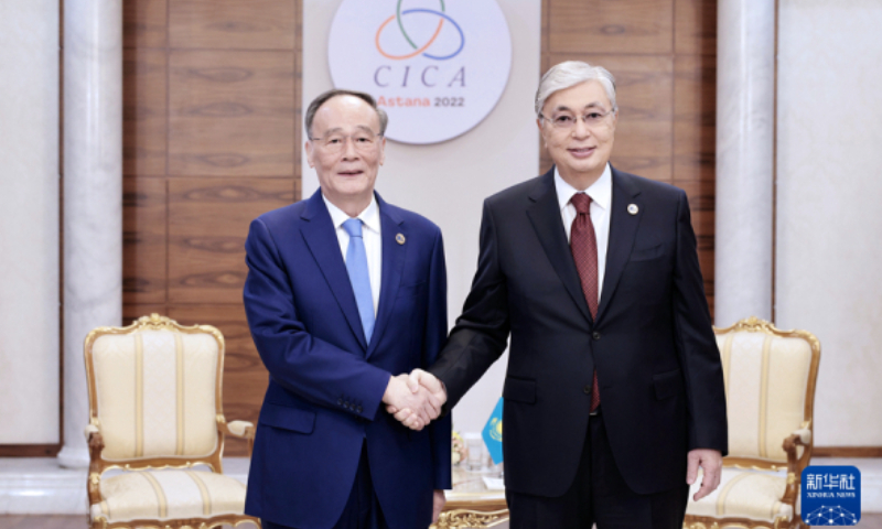 Chinese Vice President Wang Qishan (left) meets with Kazakh President Kassym-Jomart Tokayev on Thursday in Astana. Photo: Xinhua