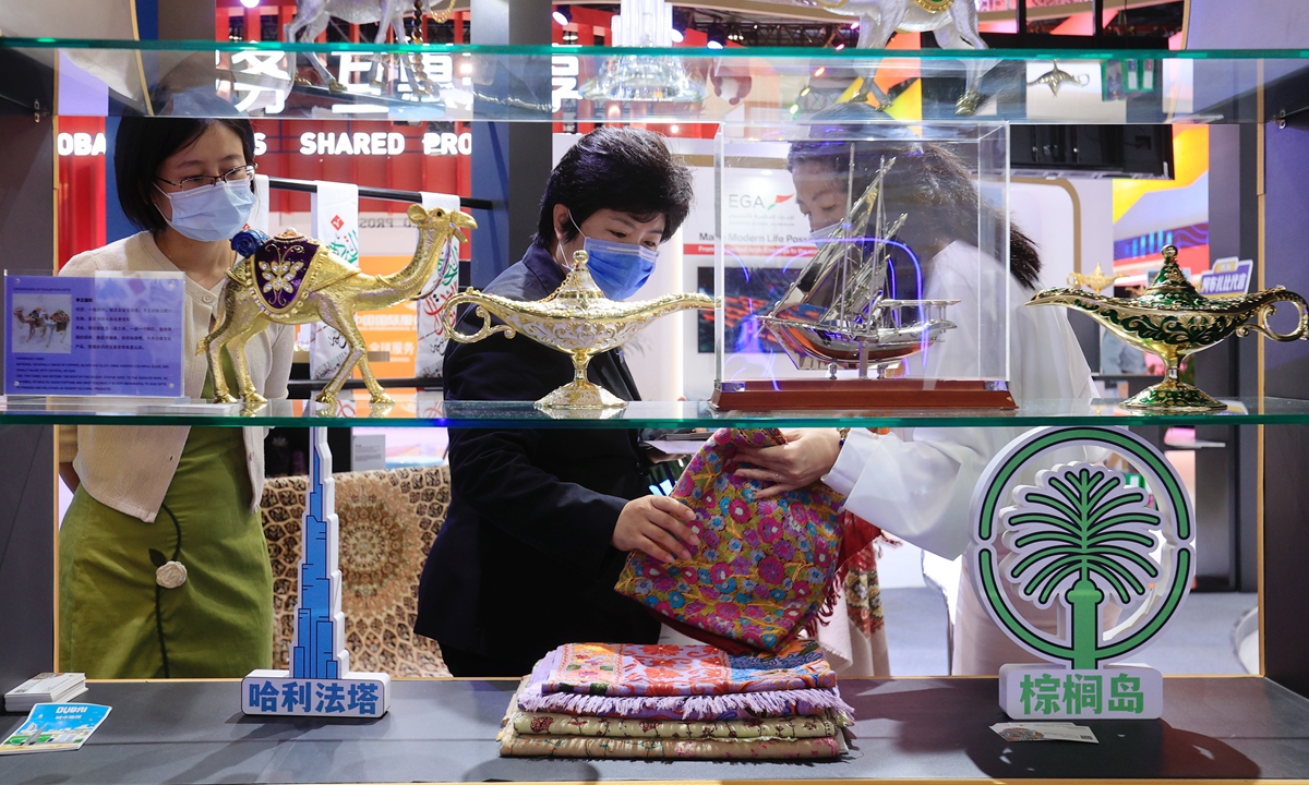People inspect wares on display at  the UAE products exhibition area at the 2022 China International Fair for Trade in Services in Beijing on September 2, 2022. Photo: VCG