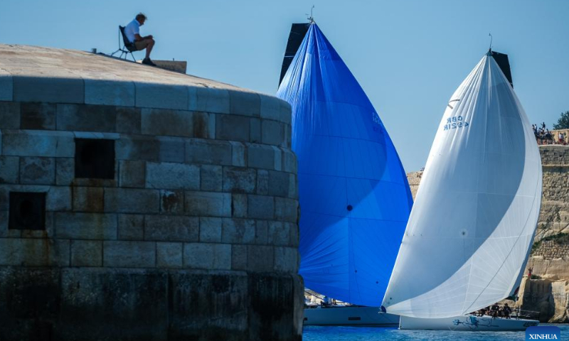 Sailing boats start from Valletta Grand Harbour during the 2022 Rolex Middle Sea Race (43rd edition) in Valletta, capital of Malta, Oct. 22, 2022. Photo: Xinhua