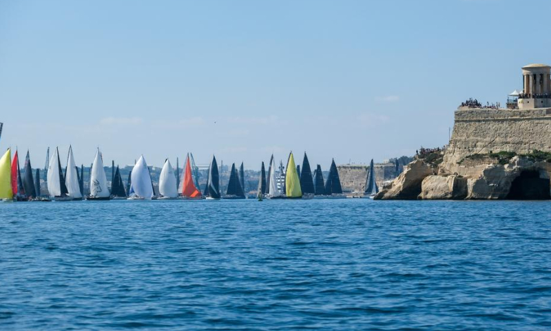 Sailing boats start from Valletta Grand Harbour during the 2022 Rolex Middle Sea Race (43rd edition) in Valletta, capital of Malta, Oct. 22, 2022. Photo: Xinhua