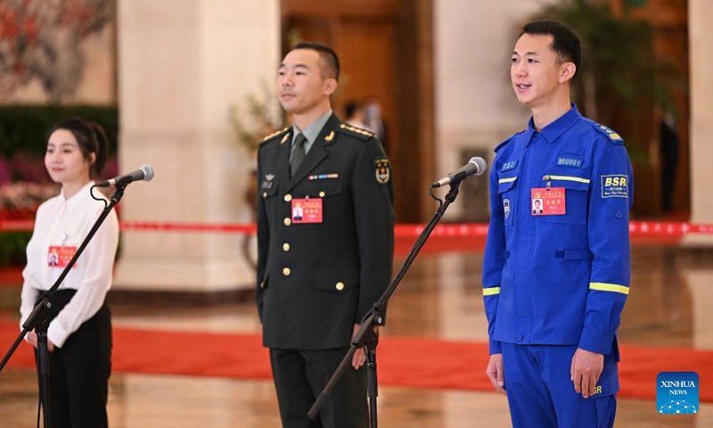 Delegates to the 20th National Congress of the Communist Party of China (CPC) Jiang Lijuan, Sun Jinlong and Yu Ruofei (from L to R), attend an interview at the Great Hall of the People in Beijing, capital of China, Oct. 16, 2022.Photo:Xinhua