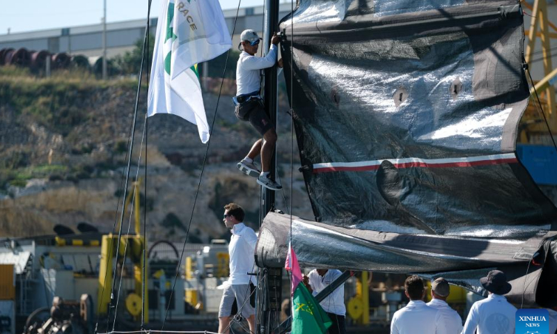 Crew members prepare on the boat before the 2022 Rolex Middle Sea Race (43rd edition) at Valletta Grand Harbour in Valletta, capital of Malta, Oct. 22, 2022. Photo: Xinhua