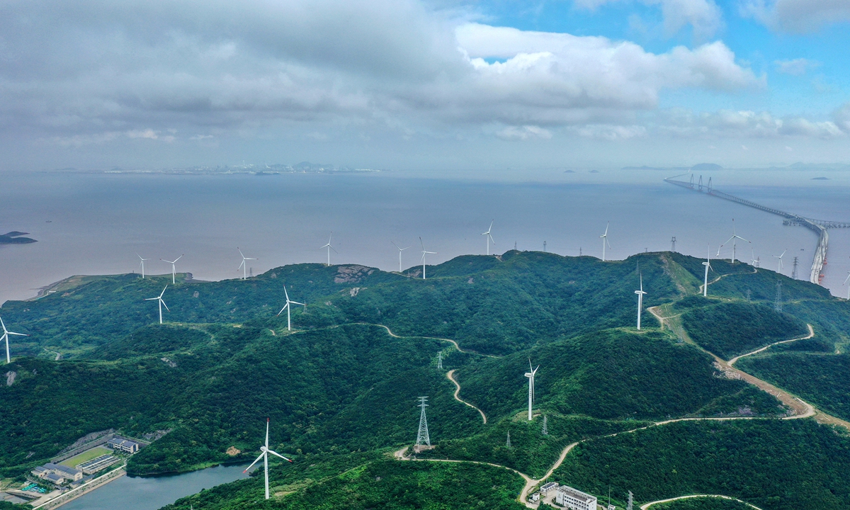 Wind turbines rotate as sea breezes flow through the Cengang Wind Farm in Zhoushan, East China's Zhejiang Province. Photo: cnsphoto 
