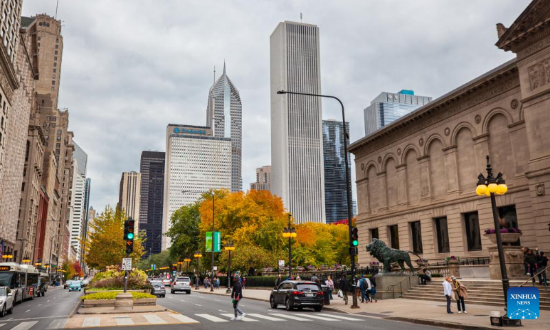Photo taken on Oct. 16, 2022 shows the fall scenery of Michigan Avenue by the Art Institute in downtown Chicago, the United States. (Photo by Vincent D. Johnson/Xinhua)