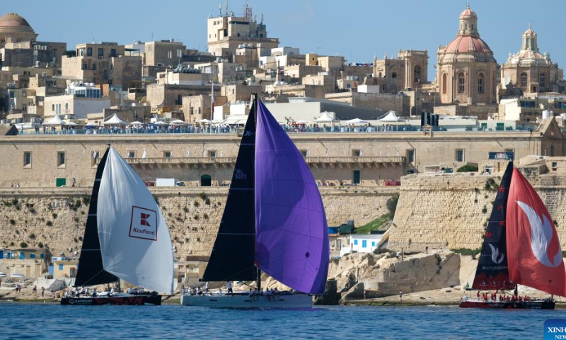 Sailing boats start from Valletta Grand Harbour during the 2022 Rolex Middle Sea Race (43rd edition) in Valletta, capital of Malta, Oct. 22, 2022. Photo: Xinhua
