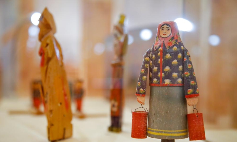 Photo taken on Oct. 15, 2022 shows traditional Russian toys at a wooden toys exhibition in Moscow, Russia.Photo:Xinhua