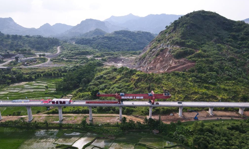 Aerial photo taken on Oct. 16, 2022 shows the construction site of the erection of the last box girder on the Jakarta-Bandung High-Speed Railway in Purwakarta, Indonesia.Photo:Xinhua