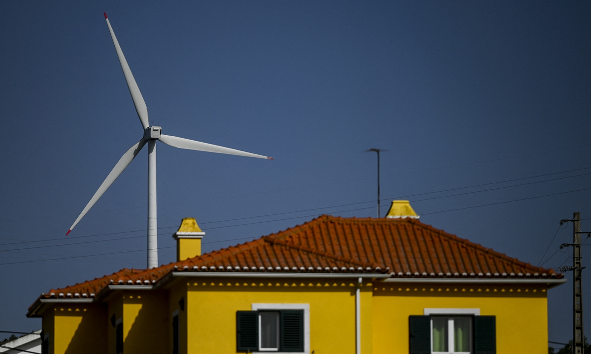 A wind turbine is seen in Loures, Portugal in early October.Photo: AFP