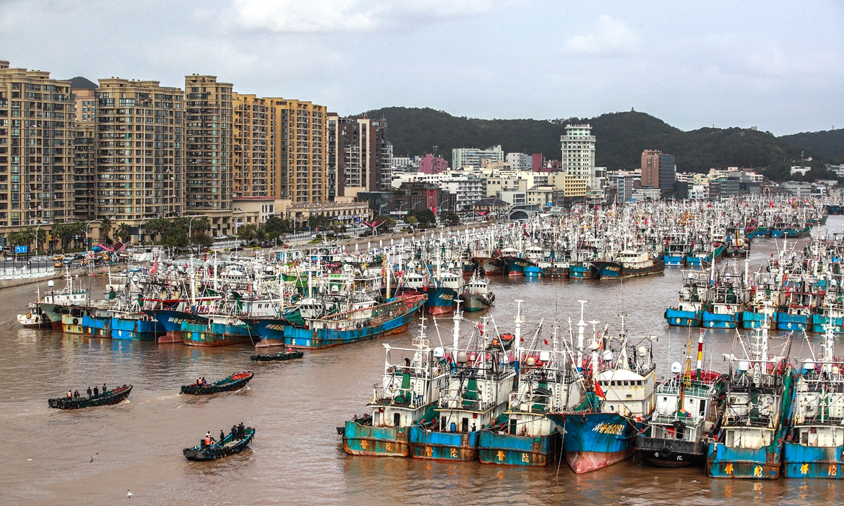 Boats harbor at a port in Zhoushan city, East China's Zhejiang Province, on October 17, 2022 due to the joint impact of Typhoon Nesat and a cold front. Photo: IC