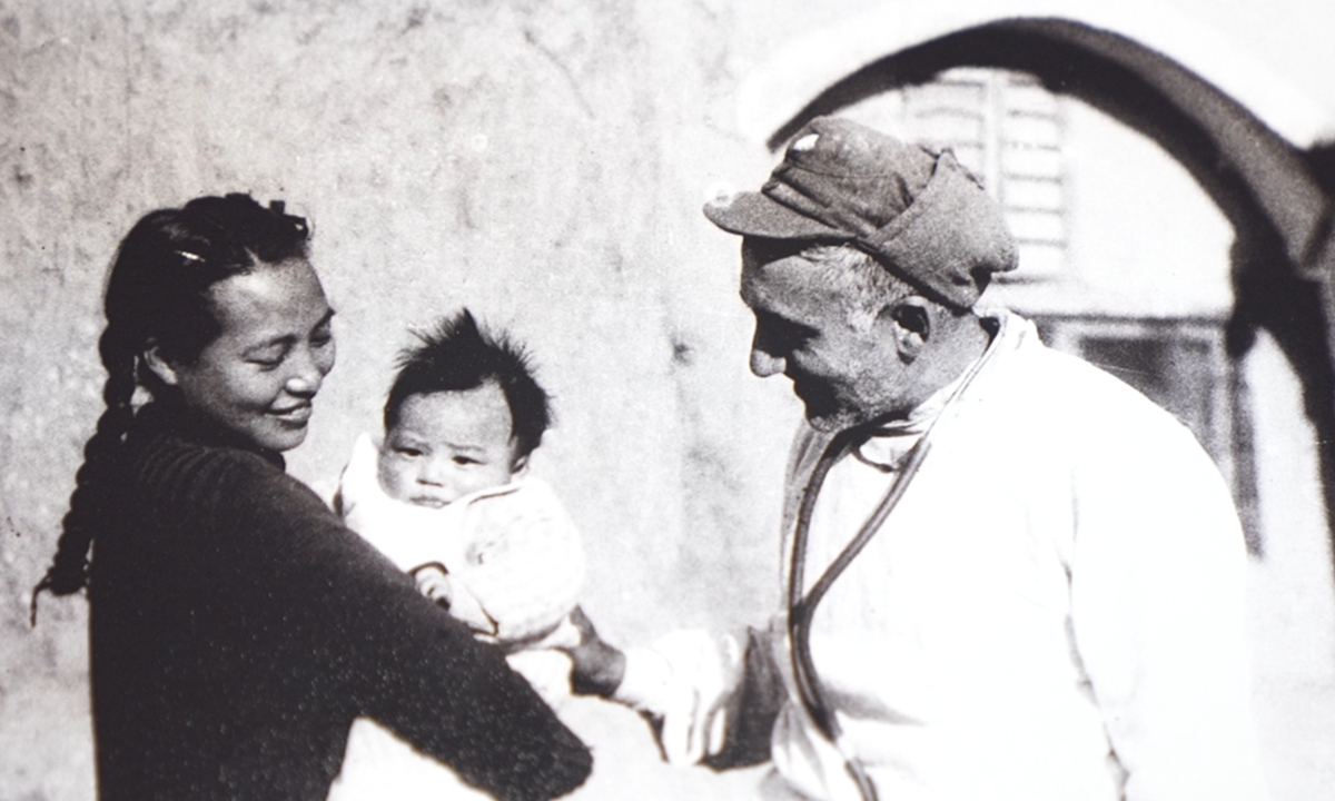 File photo: Zhou Youma (center) with his father George Hatem and his mother Zhou Sufei in Yan'an, Shaanxi Province. Photo: Courtesy of Zhou