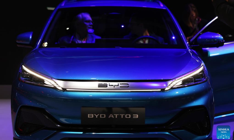 People visit the BYD stand during the Paris Motor Show in Paris, France, Oct. 17, 2022. The 89th Paris Motor Show is held here from Oct. 17 to 23.(Photo: Xinhua)