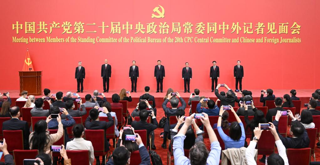 Xi Jinping, general secretary of the Communist Party of China (CPC) Central Committee, and the other newly elected members of the Standing Committee of the Political Bureau of the 20th CPC Central Committee Li Qiang, Zhao Leji, Wang Huning, Cai Qi, Ding Xuexiang and Li Xi, meet the press at the Great Hall of the People in Beijing, capital of China, Oct. 23, 2022. (Xinhua/Shen Hong)