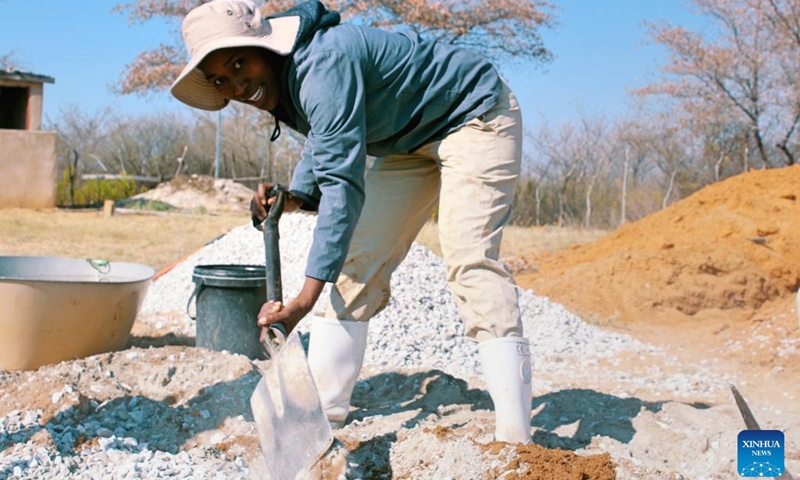 Atamelang Matale works to build a biogas digester at Betesankwe Village in the Southern District, Botswana, on Sept. 2, 2022.(Photo: Xinhua)