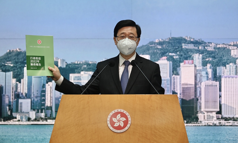 Hong Kong's Chief Executive John Lee Ka-chiu shows his first policy address to the press on October 18. Photo: IC