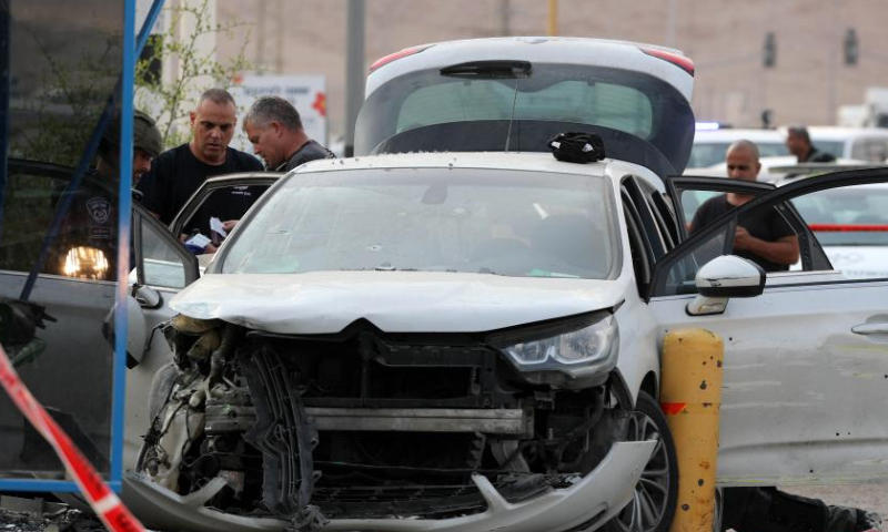 Israeli security forces work at the scene of a car-ramming attack at the Almog Junction near the West Bank city of Jericho, on Oct. 30, 2022. Photo: Xinhua