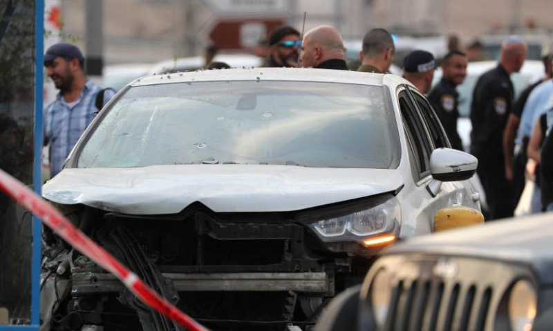Israeli security forces work at the scene of a car-ramming attack at the Almog Junction near the West Bank city of Jericho, on Oct. 30, 2022. Photo: Xinhua