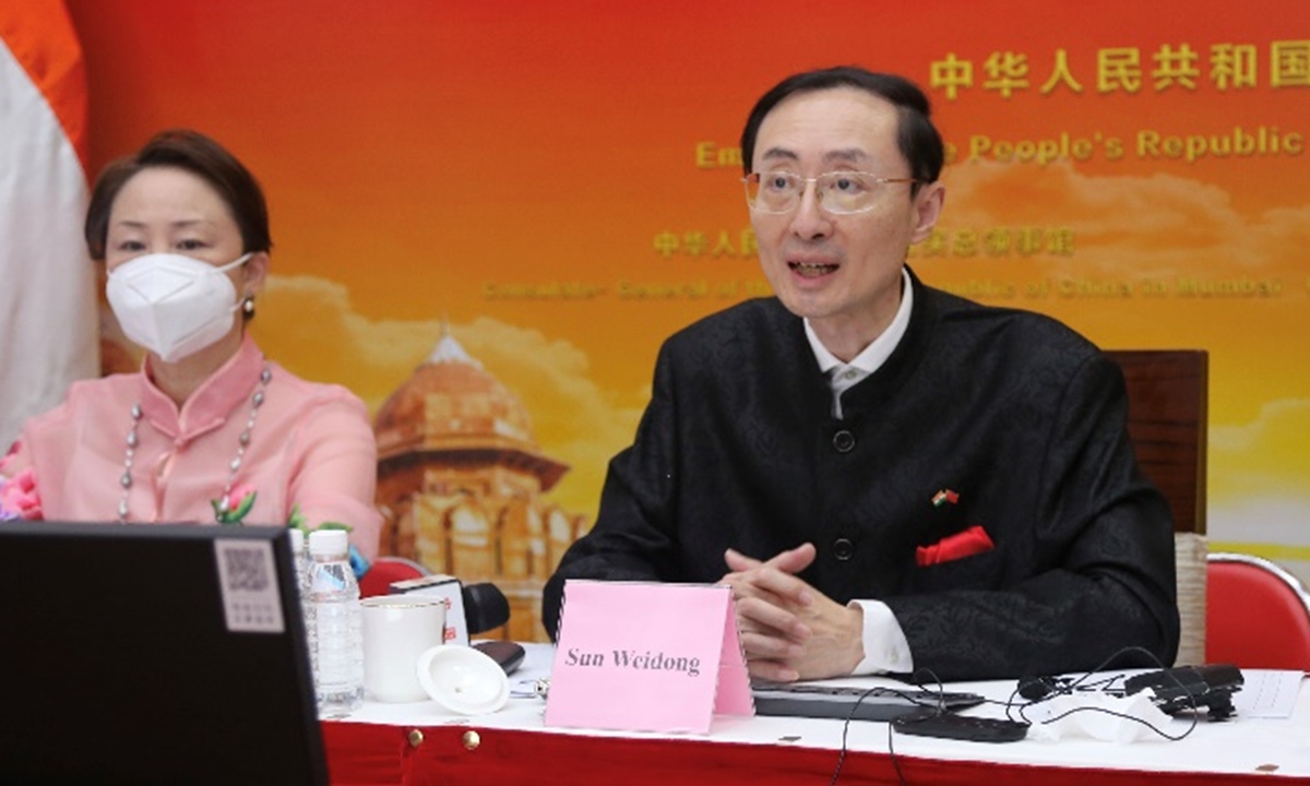 Chinese Ambassador to India Sun Weidong (right) attends a farewell webinar on October 19, 2022. Photo: Courtesy of China's Embassy in India.