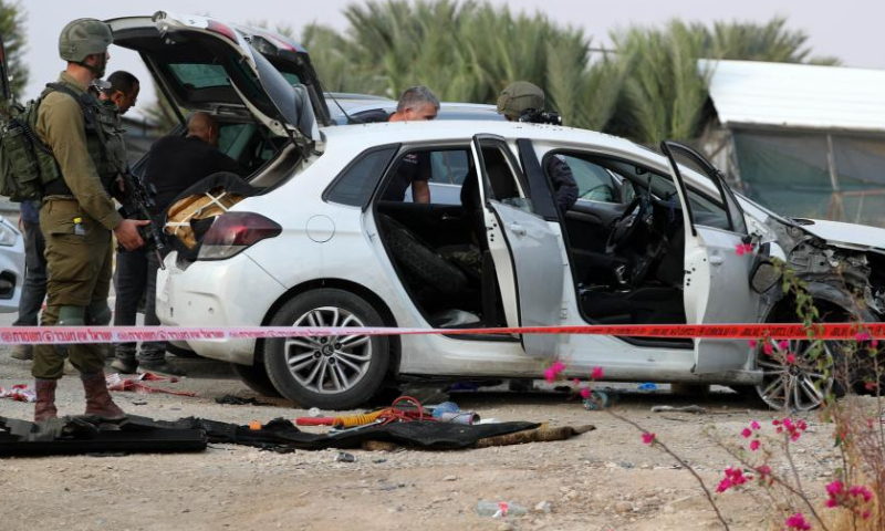 Israeli security forces work at the scene of a car-ramming attack at the Almog Junction near the West Bank city of Jericho, on Oct. 30, 2022. Photo: Xinhua
