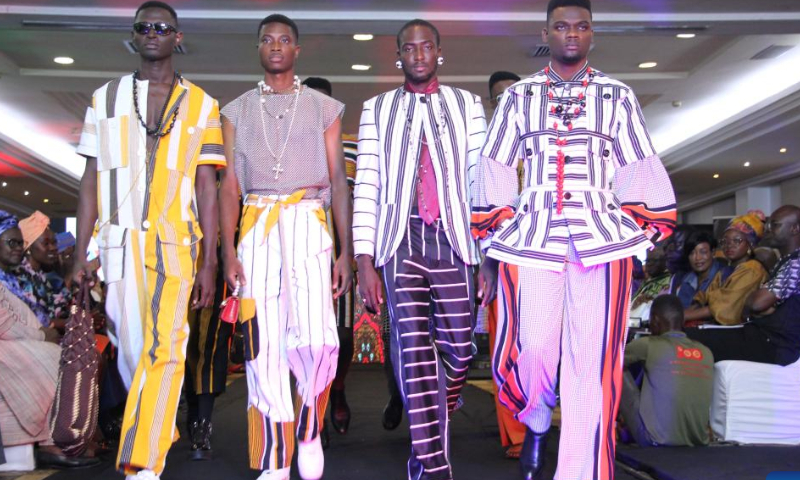 Models present creations during a fashion festival in Cotonou, Benin, Oct. 22, 2022. Photo: Xinhua