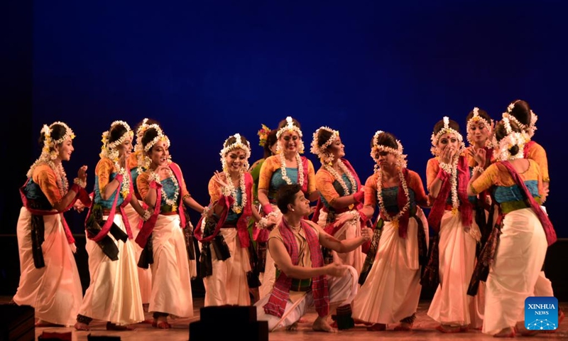 Artists perform on the stage during the drama dance Chandalika in Dhaka, Bangladesh, Oct. 23, 2022. The auditorium of Bangladesh Shilpakala Academy in Dhaka teemed with spectators on Sunday as dance drama based on the popular story Chandalika by 1913 Nobel laureate in literature Rabindranath Tagore was staged as part of an ongoing cultural festival. (Xinhua)