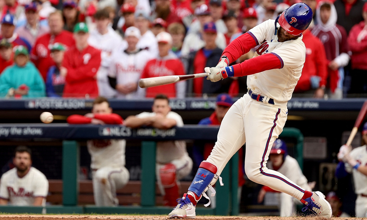 Bryce Harper of the Philadelphia Phillies hits a single against the San Diego Padres during the second inning in Game Five of the National League Championship Series in Philadelphia, the US on October 23, 2022. Photo: AFP