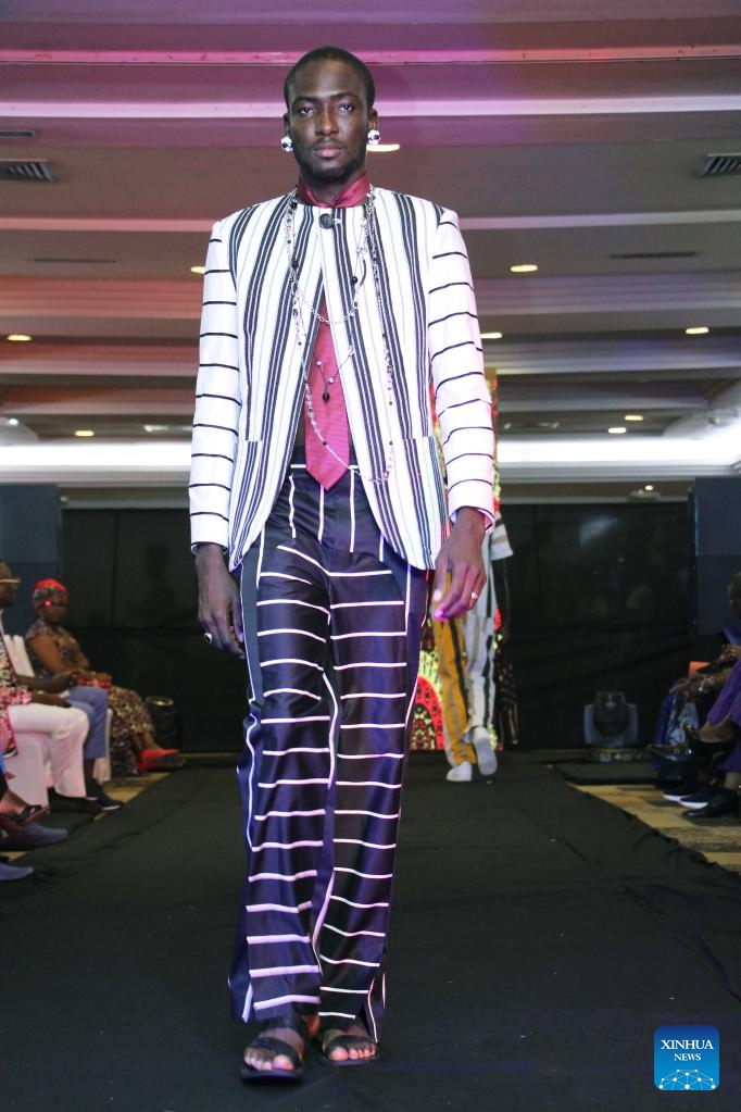 A model presents a creation during a fashion festival in Cotonou, Benin, Oct. 22, 2022.Photo: Xinhua