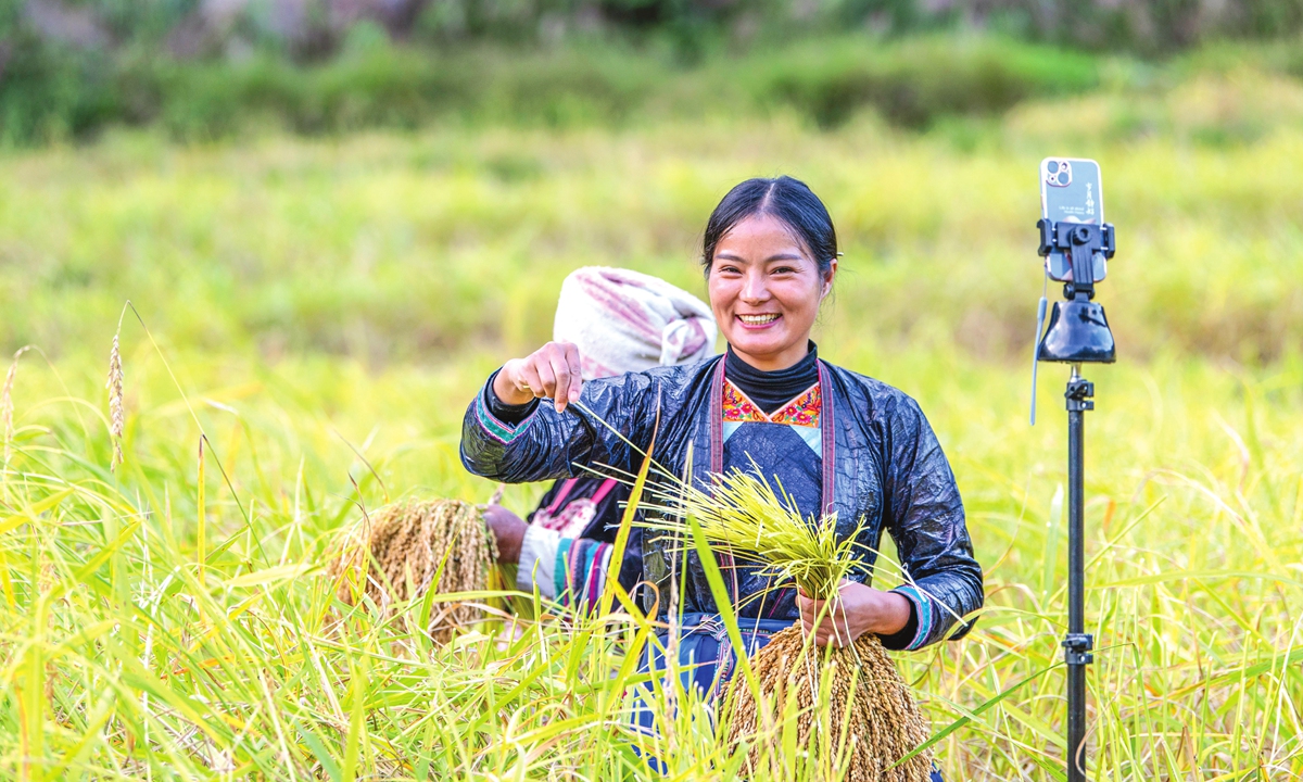 A livestreamer promotes local produced rice at Qiandongnan Miao and Dong Autonomous Prefecture, Southwest China's Guizhou Province. Photo: VCG