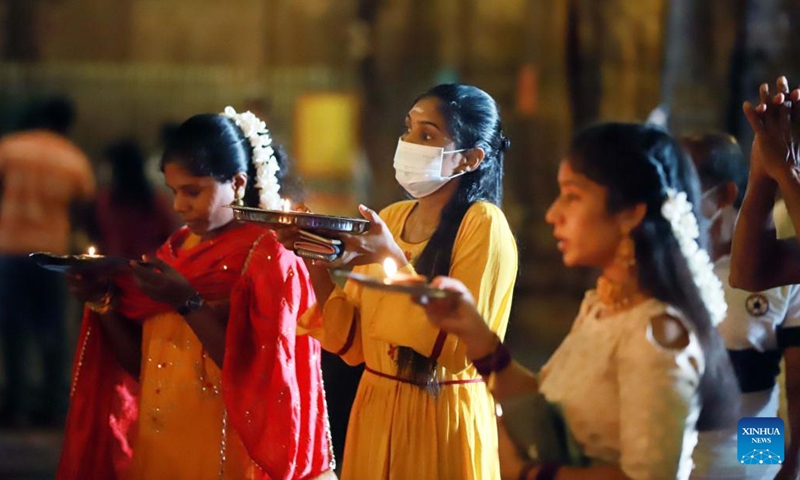 Hindu devotees celebrate Diwali, or the festival of lights, at a Hindu temple in Colombo, Sri Lanka, Oct. 24, 2022.(Photo: Xinhua)