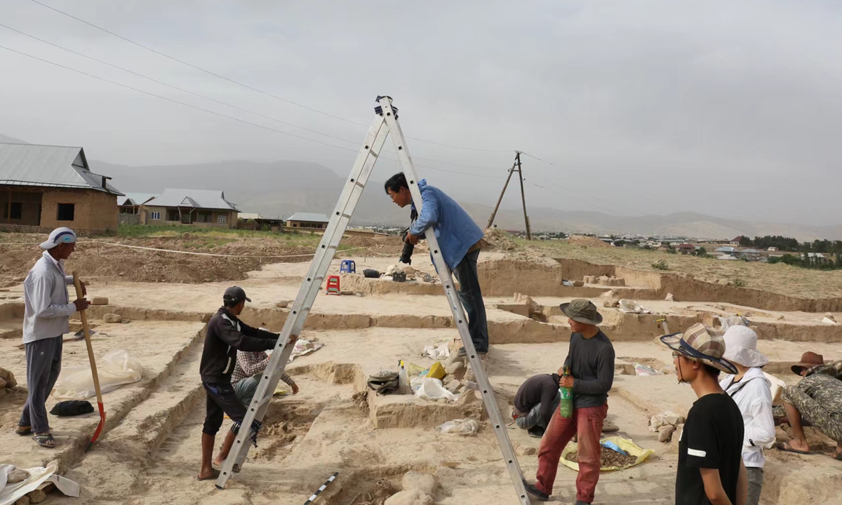 Wang Jianxin and his team at the Rabat Site near Boysun city, Uzbekistan, in 2017 Photos: Courtesy of Wang Jianxin Researchers in Wang Jianxin's team investigate an ancient site in Uzbekistan. 