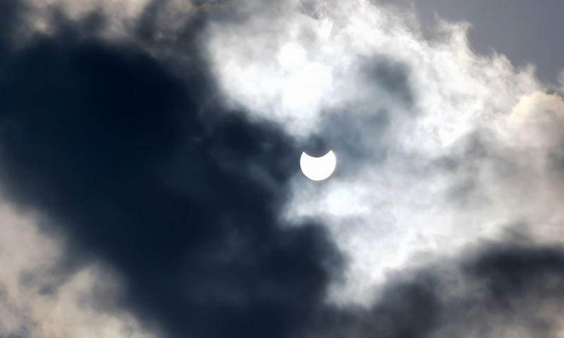 This cellphone photo taken on Oct. 25, 2022 shows a partial solar eclipse in Cairo, Egypt.(Photo: Xinhua)