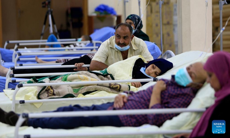 Lebanese and displaced Syrians infected with cholera are treated at a field hospital in Bibnin, Akkar, northern Lebanon, on Oct. 25, 2022. Lebanon is facing its first cholera outbreak since 1993. So far, 305 cases and 11 deaths have been reported by the Lebanese health ministry after the disease was first detected on Oct. 6.(Photo: Xinhua)