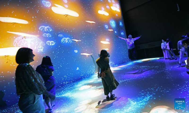 People view exhibits during a preview of the exhibition Avatar: The Experience at the Cloud Forest in Gardens by the Bay in Singapore on Oct. 26, 2022. The exhibition will officially open on Oct. 28.(Photo: Xinhua)