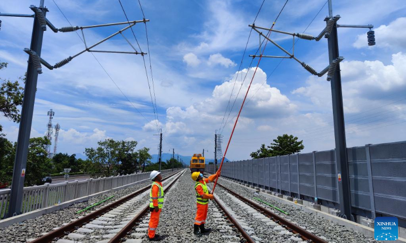 Workers conduct electricity inspection in a trial section of the Jakarta-Bandung High-Speed Railway, in Bandung, Indonesia, Nov. 5, 2022. A trial section of the Jakarta-Bandung High-Speed Railway in Indonesia has been ready for operating the EMU (Electric Multiple Units) trains after its traction substation and other equipment have been installed and commissioned on Saturday. Photo: Xinhua