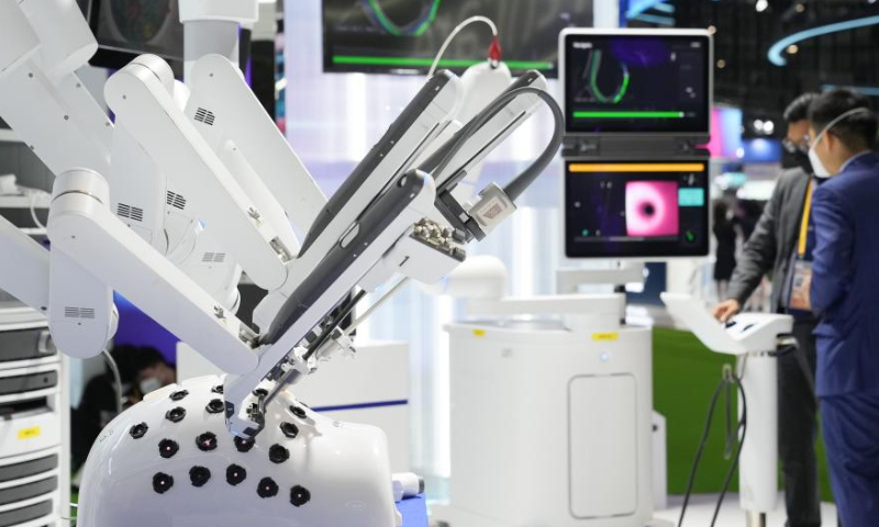 This photo taken on Nov. 6, 2022 shows a surgical robot exhibited at the Fosun Health booth in the medical equipment and healthcare products exhibition area of the fifth China International Import Expo (CIIE) at the National Exhibition and Convention Center (Shanghai) in east China's Shanghai. Photo: Xinhua