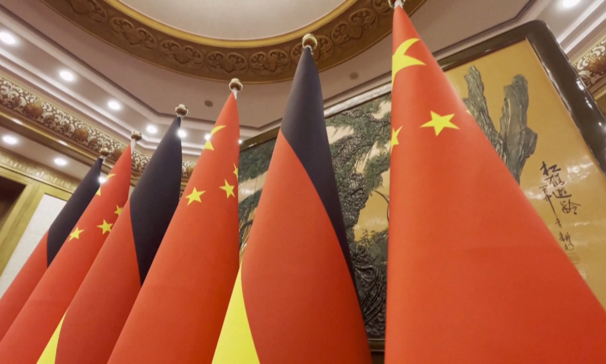 The national flags of China and Germany in the Great Hall of the People in Beijing on November 4, 2022 Photo: VCG