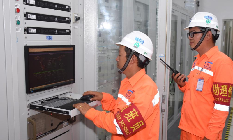 Workers carry out power transmission at a traction substation of a trial section of the Jakarta-Bandung High-Speed Railway, in Bandung, Indonesia, Nov. 5, 2022. A trial section of the Jakarta-Bandung High-Speed Railway in Indonesia has been ready for operating the EMU (Electric Multiple Units) trains after its traction substation and other equipment have been installed and commissioned on Saturday. Photo: Xinhua