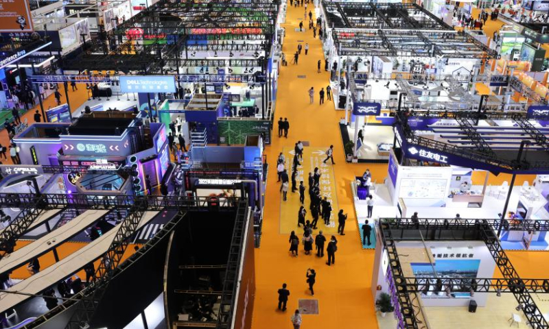This photo taken on Nov. 5, 2022 shows the Intelligent Industry and Information Technology exhibition area of the fifth China International Import Expo (CIIE) at the National Exhibition and Convention Center (Shanghai) in east China's Shanghai. The fifth CIIE is scheduled on Nov. 5-10 in China's economic hub Shanghai. Photo: Xinhua
