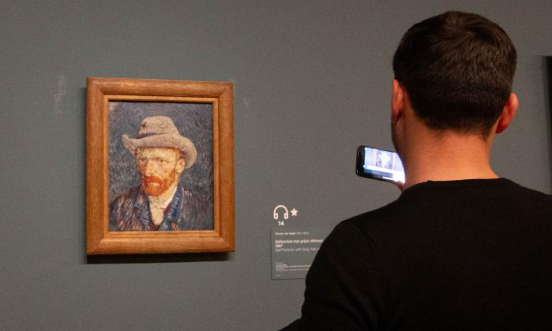 A man takes pictures of an artwork by Van Gogh at the Van Gogh Museum in Amsterdam, the Netherlands, Nov. 5, 2022. Amsterdam Museum Night, an annual event which allows people to visit Amsterdam's museums during night time, kicked off here Saturday.  Photo: Xinhua