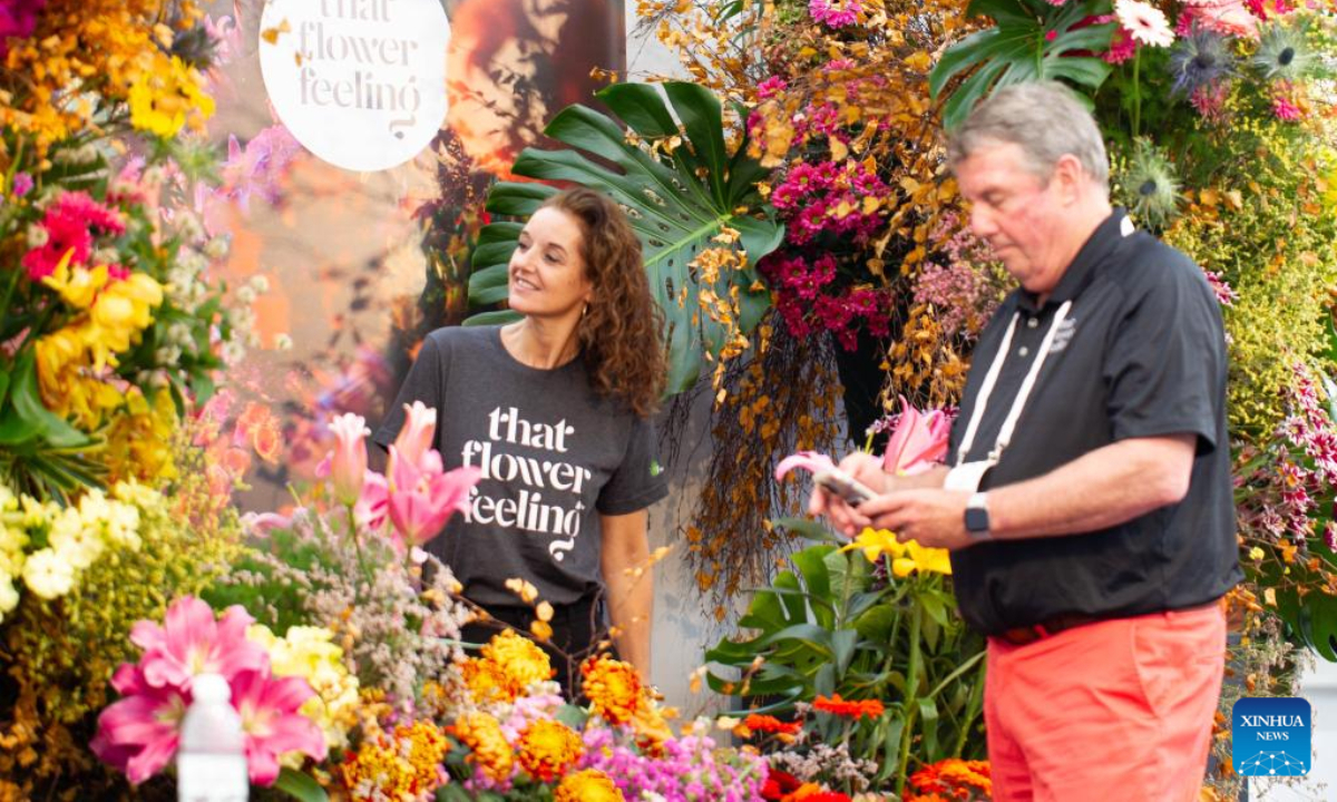 People visit 2022 International Floriculture Trade Fair in Vijfhuizen, the Netherlands, on Nov 11, 2022. Photo:Xinhua