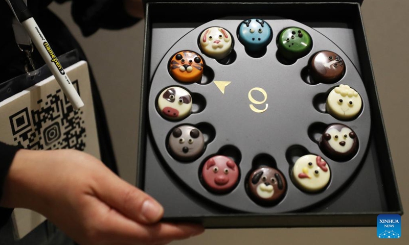 A South Korean chocolatier displays chocolates at the 27th Salon du Chocolat at the Versailles Expo in Paris, France, Oct. 31, 2022. The 27th Salon du Chocolat (chocolate fair) was held from Oct. 28 to Nov. 1.(Photo: Xinhua)