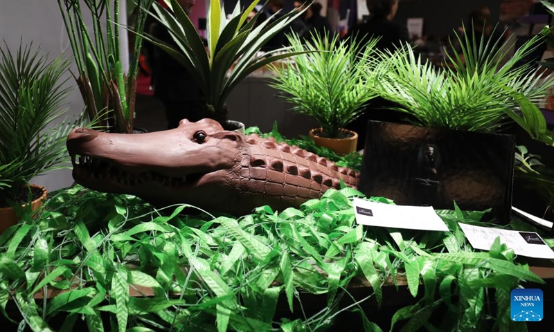 A crocodile sculpture made of chocolate is seen at the 27th Salon du Chocolat at the Versailles Expo in Paris, France, Oct. 31, 2022. The 27th Salon du Chocolat (chocolate fair) was held from Oct. 28 to Nov. 1.(Photo: Xinhua)
