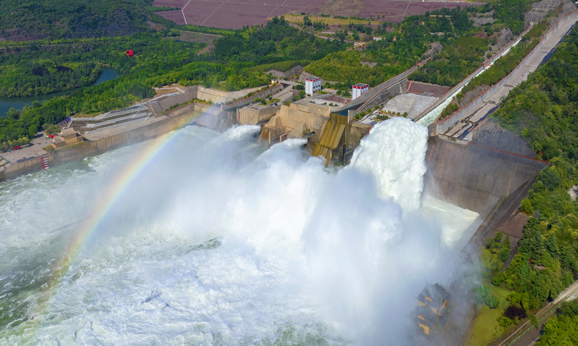 The Xiaolangdi Dam enters the water transfer stage on June 23, 2022, and the Yellow River’s water flows out from the flood relief port. Photo: VCG