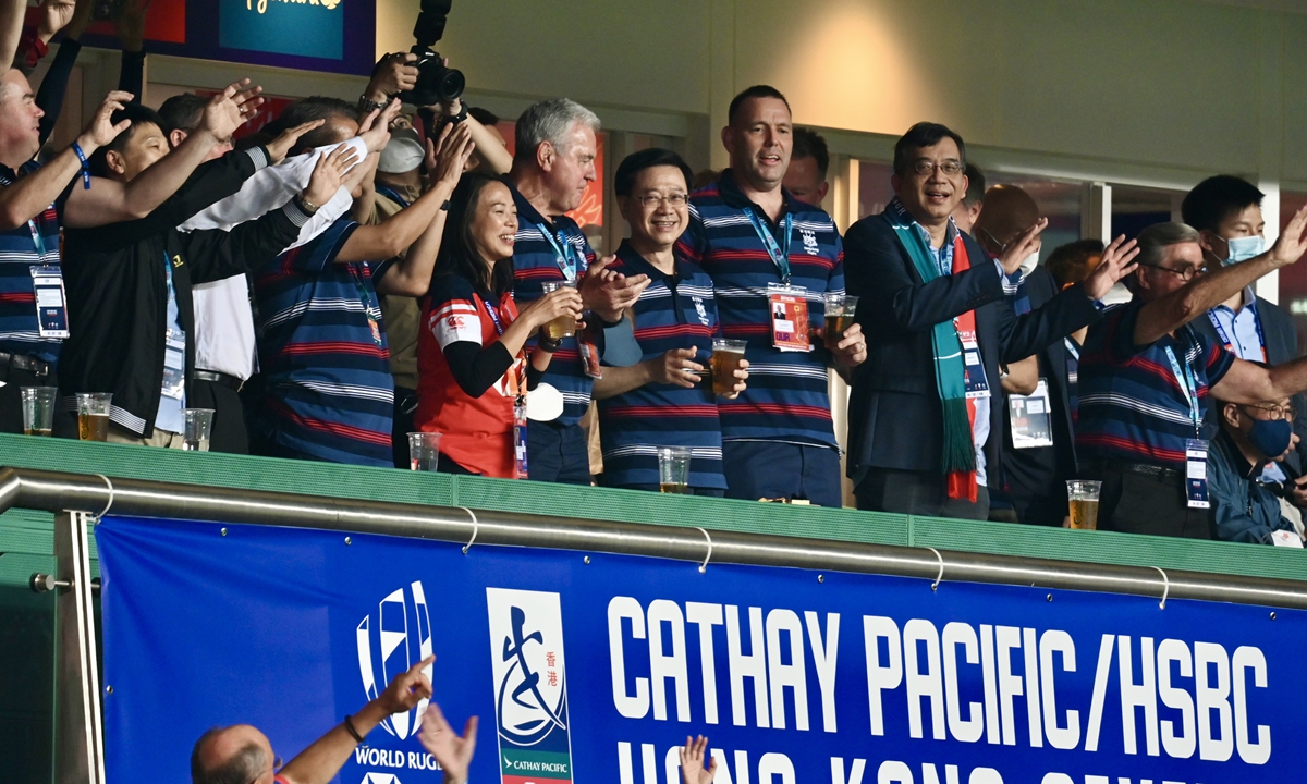 Hong Kong's Chief Executive John Lee Ka-chiu (center) watches the final of the Hong Kong Rugby Sevens tournament at the Hong Kong Stadium on November 6,2022. The three-day tournament kicked off on Friday for the first time since COVID-19 hit. Photo: cnsphotos