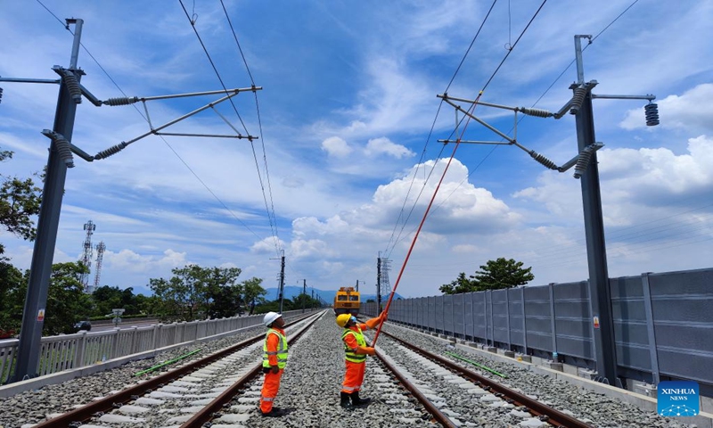 Workers check electricity system in a trial section of the Jakarta-Bandung High-Speed Railway,in Bandung,Indonesia,on November 5 2022. Photo: Xinhua