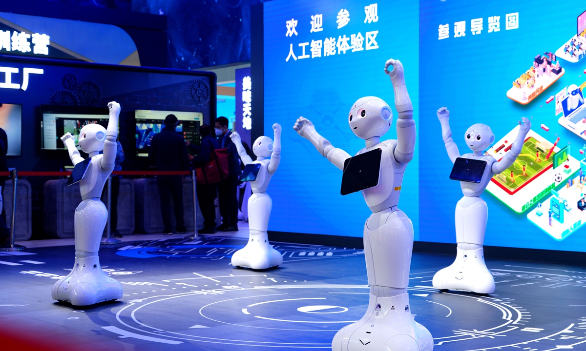 Robots dance at the artificial intelligence (AI) experience zone of the fifth China International Import Expo (CIIE) on November 6, 2022. It is the first time for the CIIE to feature an AI zone, which has a 300-square meter exhibition area and seven application scenarios. Photo: VCG