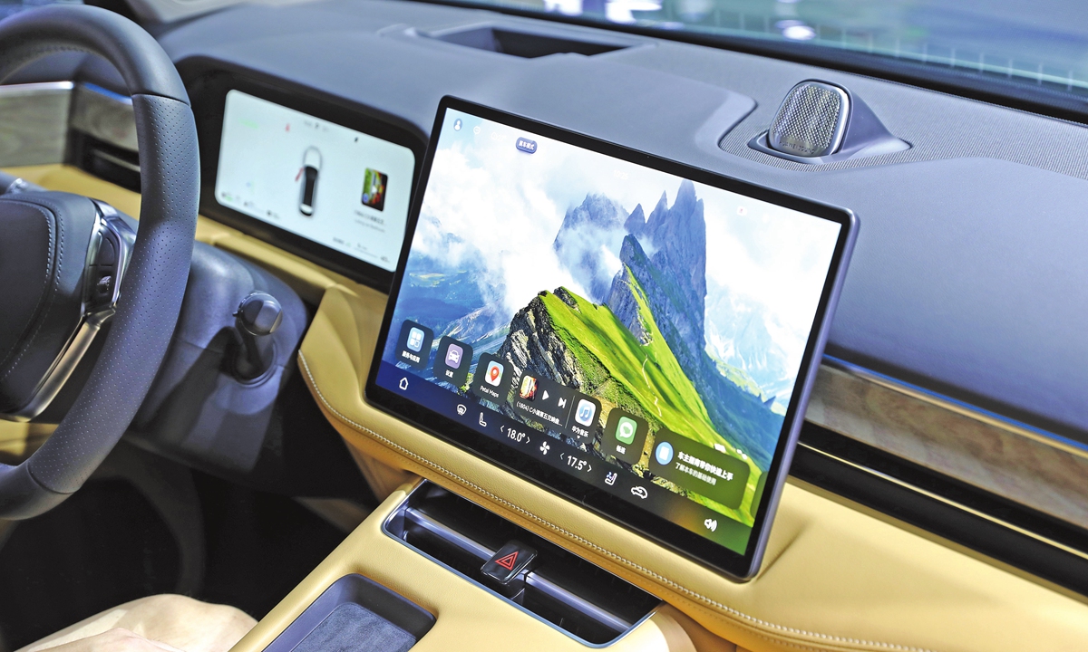 An electric car installed with China-made operation software Photo: VCG