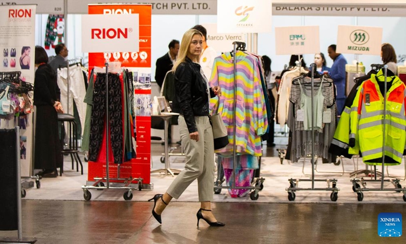 People attend the 2022 Apparel Textile Sourcing Trade Show in Toronto, Canada, on Nov. 7, 2022. As the largest apparel and textile sourcing event in Canada, the three-day event kicked off here on Monday.(Photo: Xinhua)