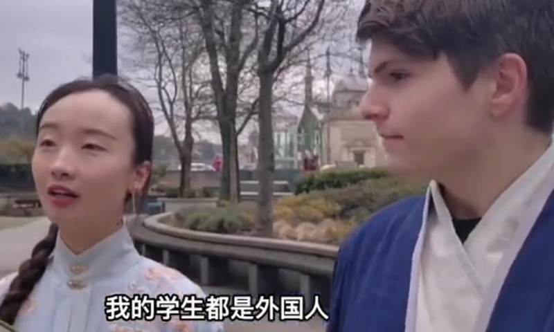Yang Yang, a teacher at a university in Xi'an, Northwest China's Shaanxi Province, is now a state-funded doctoral student in Hungary, wearing traditional Chinese clothing with her student. Screenshot of Star Video 