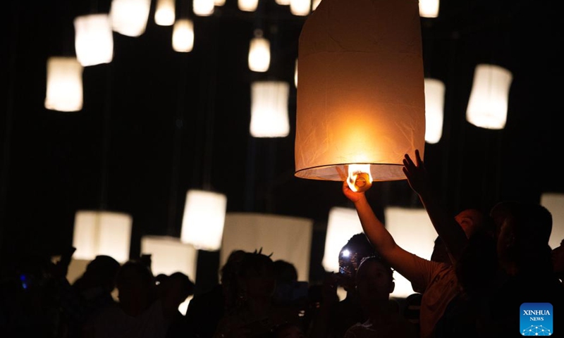 People release a sky lantern to make a wish for good fortune in Chiang Mai, Thailand, on Nov. 8, 2022.(Photo: Xinhua)